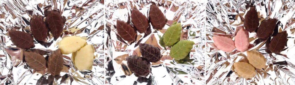 CHOCOLATE HOUSE Mon Loire（チョコレートハウス モンロワール）のリーフメモリーの左から橙・緑・桃の巾着の中身の写真